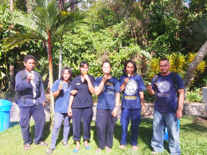 staff sampling fruit ice 