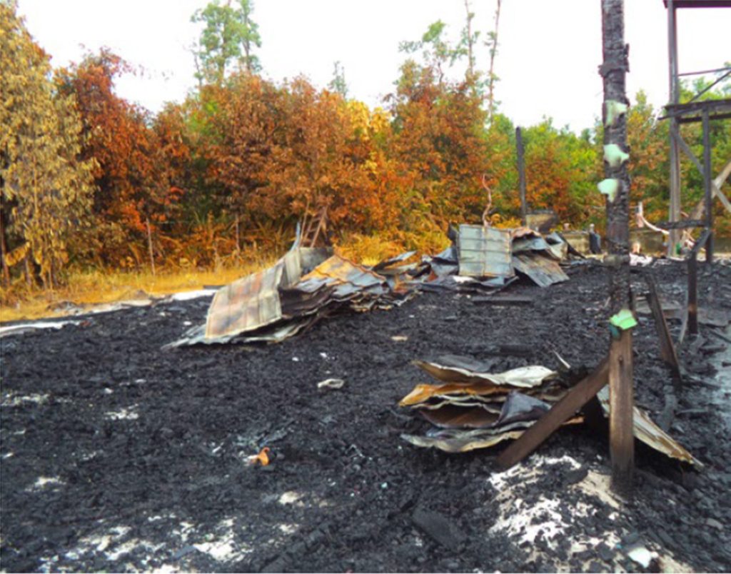 Burned down patrol post & forest near strip mine